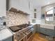 Stainless steel range and white farmhouse sink at 8440 Mossy Cup Trl, Harrisburg, NC 28075