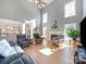 Spacious living room with high ceilings and fireplace at 8440 Mossy Cup Trl, Harrisburg, NC 28075