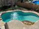 Aerial view of a freeform swimming pool at 8440 Mossy Cup Trl, Harrisburg, NC 28075