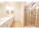 Bright bathroom with double vanity and shower at 9009 Powder Works Dr, Huntersville, NC 28078