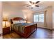 Comfortable bedroom features natural light, a ceiling fan, and classic decor at 9009 Powder Works Dr, Huntersville, NC 28078