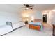 Spacious bedroom with two beds, ceiling fan, and ample natural light at 9009 Powder Works Dr, Huntersville, NC 28078