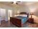 Bedroom with traditional decor and a view into the bathroom at 9009 Powder Works Dr, Huntersville, NC 28078