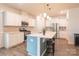 Modern kitchen with white cabinetry, stainless steel appliances, and an island at 9009 Powder Works Dr, Huntersville, NC 28078