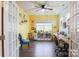 Sunlit home office with hardwood floors and double French doors at 9009 Powder Works Dr, Huntersville, NC 28078