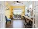 Bright home office with built-in shelving and hardwood floors at 9009 Powder Works Dr, Huntersville, NC 28078