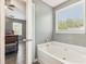 Bathroom with garden tub and access to bedroom at 9022 Belle Bragg Way, Charlotte, NC 28214