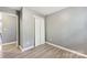 Gray walls and wood-look floors in this bedroom at 9022 Belle Bragg Way, Charlotte, NC 28214