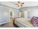 Spacious bedroom with wood flooring and en-suite bathroom at 9022 Belle Bragg Way, Charlotte, NC 28214