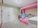 Basement bedroom with double doors and canopy bed at 9117 Monarchos Ct, Waxhaw, NC 28173