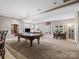 Finished basement with pool table and dining area at 9117 Monarchos Ct, Waxhaw, NC 28173