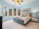 Bright bedroom with large windows and comfy bed at 9117 Monarchos Ct, Waxhaw, NC 28173