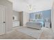 Bright bedroom with light blue walls and a large bed at 9117 Monarchos Ct, Waxhaw, NC 28173