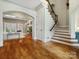 Hardwood floors and staircase in spacious entryway at 9117 Monarchos Ct, Waxhaw, NC 28173