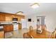 Cozy kitchen and dining area filled with natural light and traditional cabinetry at 926 Lone Oak Ln, Mooresville, NC 28115