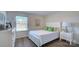 Bright bedroom with a queen bed, dresser, and window at 1020 20Th Avenue Se Way, Hickory, NC 28602