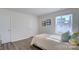 Bedroom with twin bed, dresser and window at 1020 20Th Avenue Se Way, Hickory, NC 28602