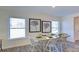 Spacious dining area with a farmhouse table and natural light at 1020 20Th Avenue Se Way, Hickory, NC 28602