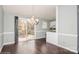 Dining area with hardwood floors and kitchen view at 10414 Club Car Ct, Mint Hill, NC 28227