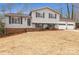 Ranch style home with attached two-car garage and landscaping at 10414 Club Car Ct, Mint Hill, NC 28227