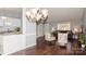 Kitchen with white cabinets and granite countertops at 10414 Club Car Ct, Mint Hill, NC 28227