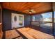 Spacious wooden back deck with ceiling fan and access to home at 110 Hubbard St, Belmont, NC 28012