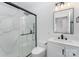 Clean bathroom with marble shower and vanity at 110 Hubbard St, Belmont, NC 28012