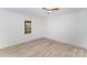 Bright bedroom with wood floors and a window view at 110 Hubbard St, Belmont, NC 28012