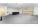 Large garage with bar, sink, and additional toilet at 110 Hubbard St, Belmont, NC 28012