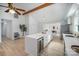 Modern kitchen with white cabinets and a wine cooler at 110 Hubbard St, Belmont, NC 28012