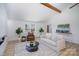 Living room with hardwood floors, a fireplace and large windows at 110 Hubbard St, Belmont, NC 28012