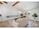 Bright living room with hardwood floors and a built-in fireplace at 110 Hubbard St, Belmont, NC 28012