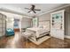 Serene bedroom with built-in bookcases and hardwood floors at 1101 Churchill Downs Dr, Waxhaw, NC 28173