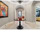 Elegant foyer with high ceilings and a round table at 1101 Churchill Downs Dr, Waxhaw, NC 28173