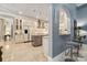 Kitchen with breakfast bar and view into adjacent dining area at 1101 Churchill Downs Dr, Waxhaw, NC 28173