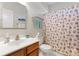 Clean bathroom with shower, toilet and vanity at 11104 Fox Cove Dr, Charlotte, NC 28273