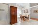 Cozy breakfast nook with wood table and blue cushioned chairs at 11104 Fox Cove Dr, Charlotte, NC 28273