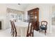 Spacious dining room with large windows and hardwood floors at 11104 Fox Cove Dr, Charlotte, NC 28273