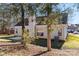 Rear view of house showing patio and backyard at 11104 Fox Cove Dr, Charlotte, NC 28273