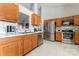 Kitchen with stainless steel appliances and wood cabinets at 11104 Fox Cove Dr, Charlotte, NC 28273