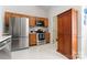 Modern kitchen with stainless steel appliances and wood cabinetry at 11104 Fox Cove Dr, Charlotte, NC 28273