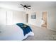 Bright bedroom with a ceiling fan, neutral walls, and carpet flooring at 1120 Spicewood Pines Rd, Fort Mill, SC 29708