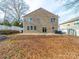 Tan house exterior with sliding glass doors leading to the patio at 1120 Spicewood Pines Rd, Fort Mill, SC 29708