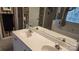 Elegant bathroom with double sinks and a garden tub at 113 Rocky Trail Ct, Fort Mill, SC 29715