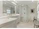 All white bathroom featuring a glass enclosed walk-in shower and hexagon tile flooring at 1136 Bolling Rd, Charlotte, NC 28207