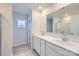 Bathroom featuring double sink vanity, large mirror, and a shower at 1175 Blackburn Cir, Edgemoor, SC 29712