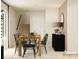 Bright dining room featuring a wooden table with six chairs and a statement mirror at 1175 Blackburn Cir, Edgemoor, SC 29712