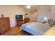 Main bedroom with hardwood floors and large windows at 12111 Frogs Leap Ct, Charlotte, NC 28277