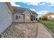 Spacious backyard patio with stone pathway and screened porch at 1265 Maddy Ln, Rock Hill, SC 29732