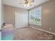 Bright bedroom featuring a large window and closet at 1265 Maddy Ln, Rock Hill, SC 29732